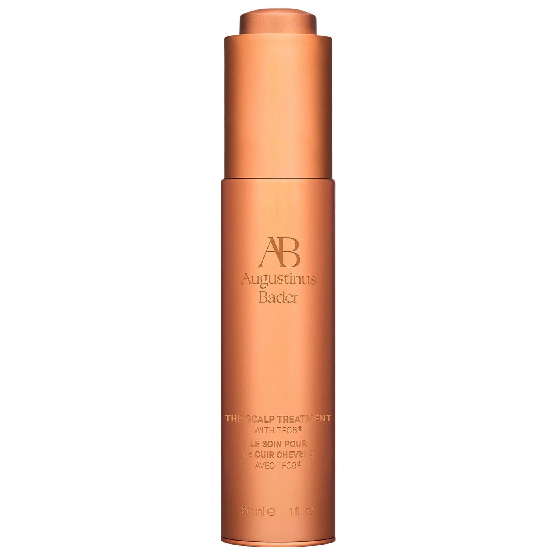 The Scalp Treatment bottle by Augustinus Bader, rose-gold cylindrical bottle on Tampa Home & Garden Store