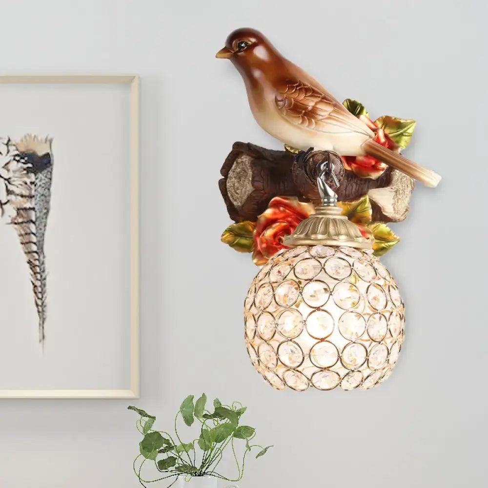 Brown bird wall sconce with crystal globe shade by Decorbites on Tampa Home & Garden Store