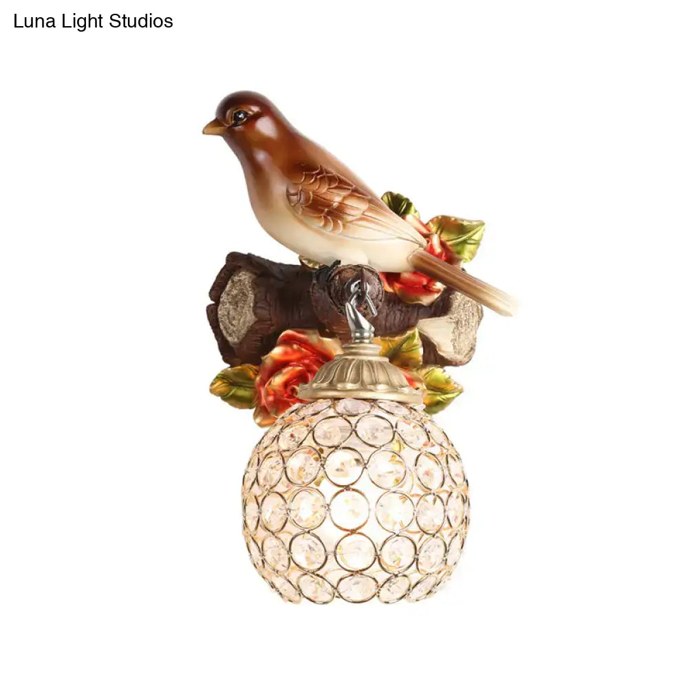Brown Bird Wall Sconce with crystal globe shade by Decorbites on Tampa Home & Garden Store