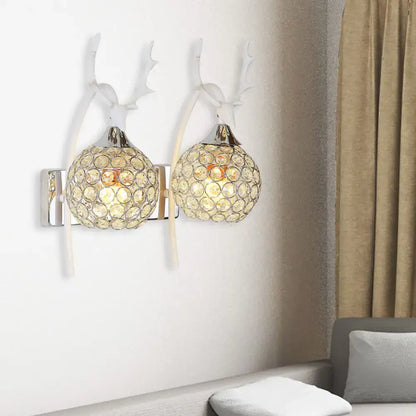 Decorbites chrome deer wall sconce with two crystal-dome lights on Tampa Home & Garden Store
