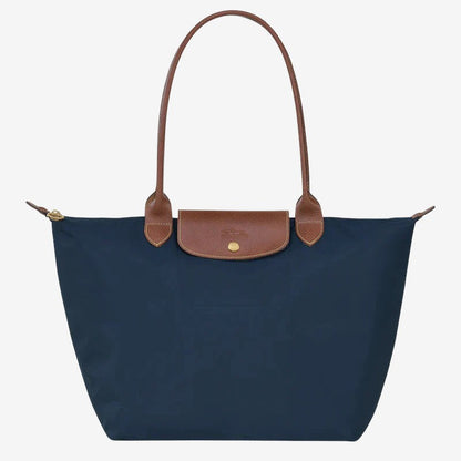 Large Classic Shoulder Handbag Moktan Sabai navy bag with brown leather trim and flap on Tampa Home & Garden Store