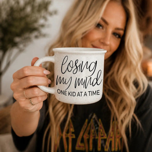 Gia Roma Losing Mind mug, white speckled with black script Losing Mind and One Kid At A Time on Tampa Home & Garden Store