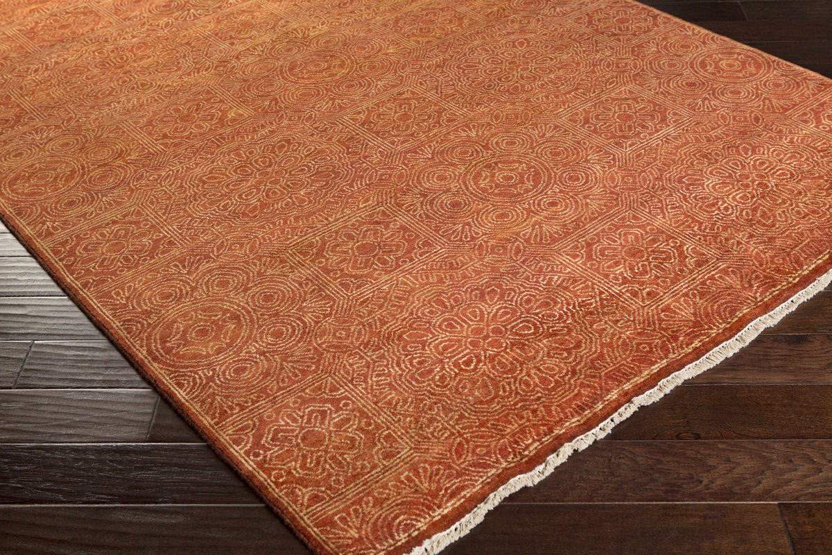 Lottsburg Premium Orange Wool Rug by Boutique Rugs with floral medallion pattern and fringe on Tampa Home & Garden Store