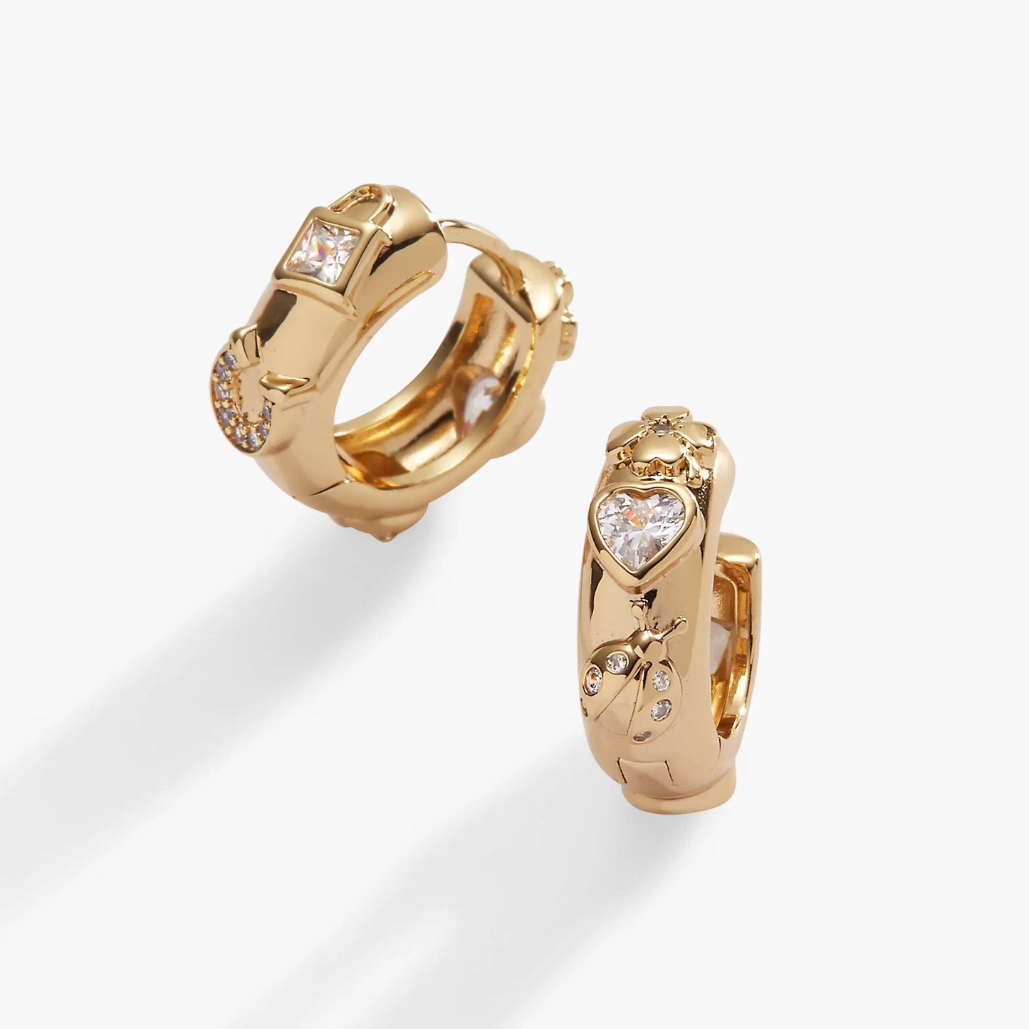 Love and Luck Huggie Hoops with Lucky Symbols
