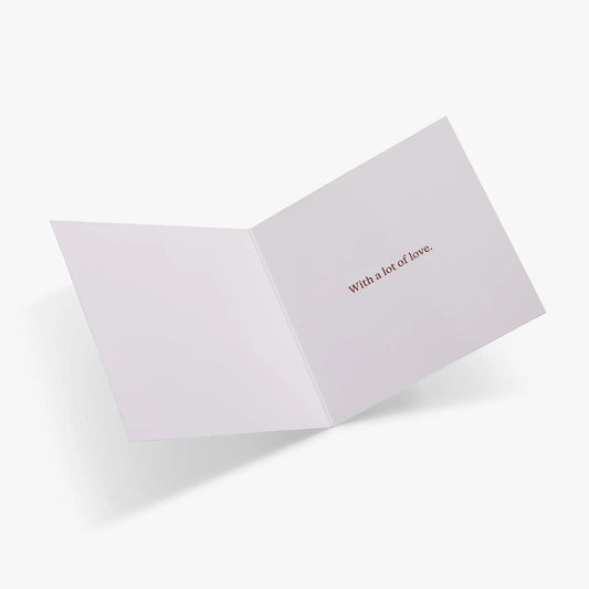 Love Greeting Card open to pale lavender interior with a lot of love text on the right page on Tampa Home & Garden Store