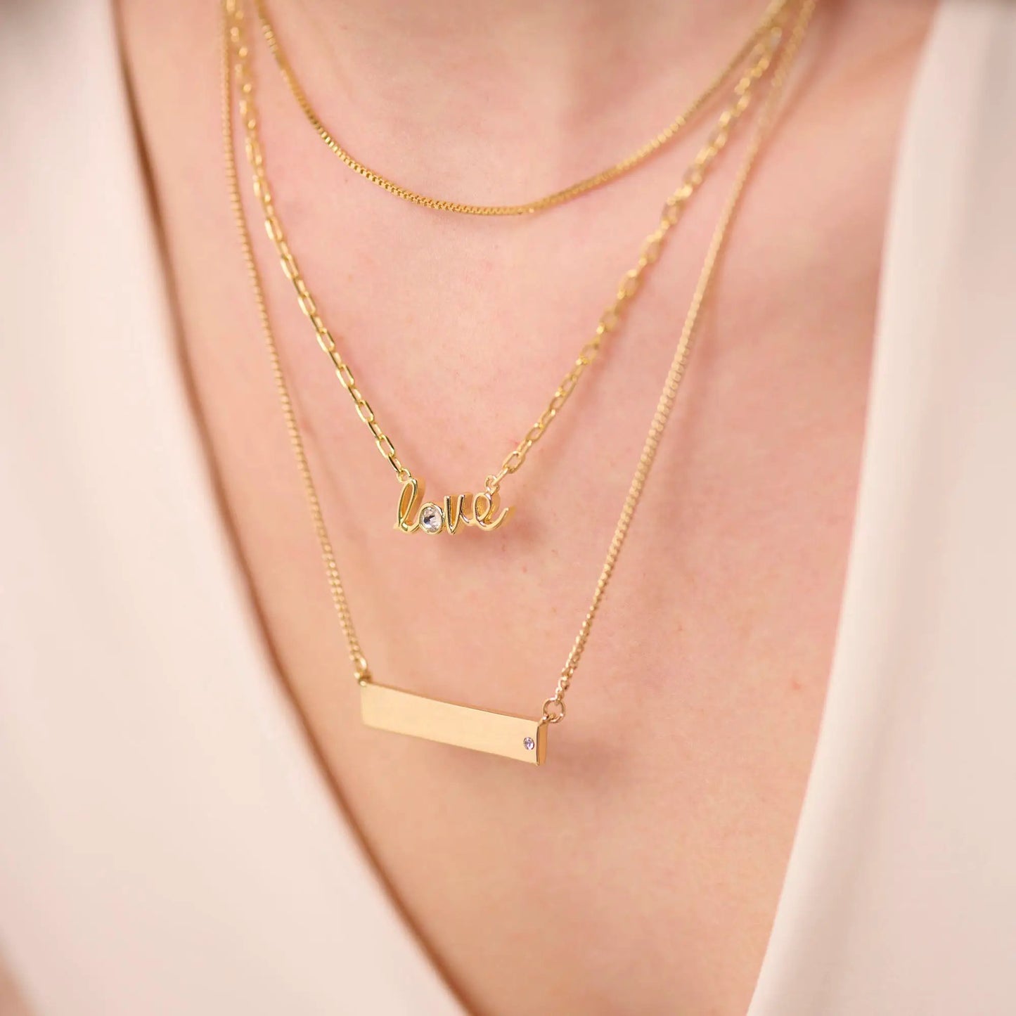 Bar Necklace with Crystal Accent by Alex and Ani, gold-tone layered with slim chains on Tampa Home & Garden Store