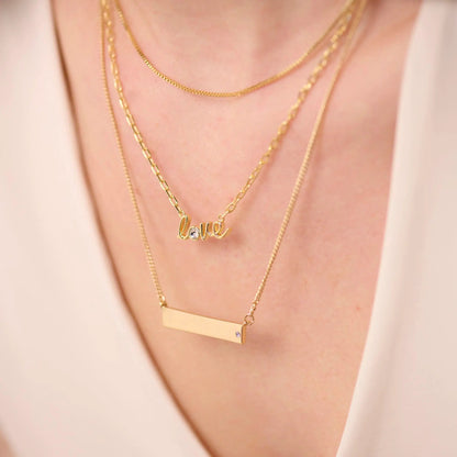 Bar Necklace with Crystal Accent by Alex and Ani, gold-tone layered with slim chains on Tampa Home & Garden Store