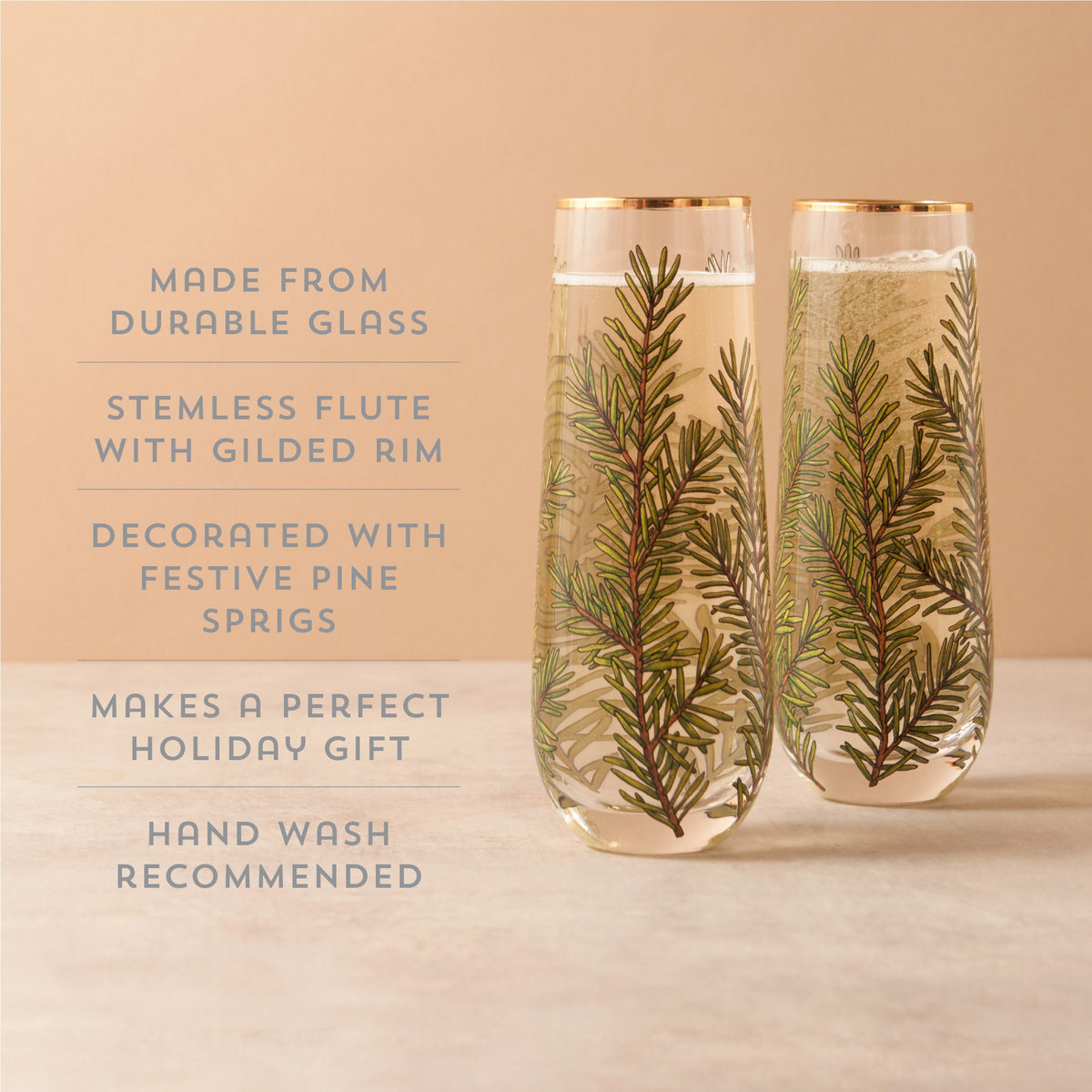 Woodland Stemless Champagne Flute Set by Twine Living, 2-piece with gold rims and pine sprig print on Tampa Home & Garden Store