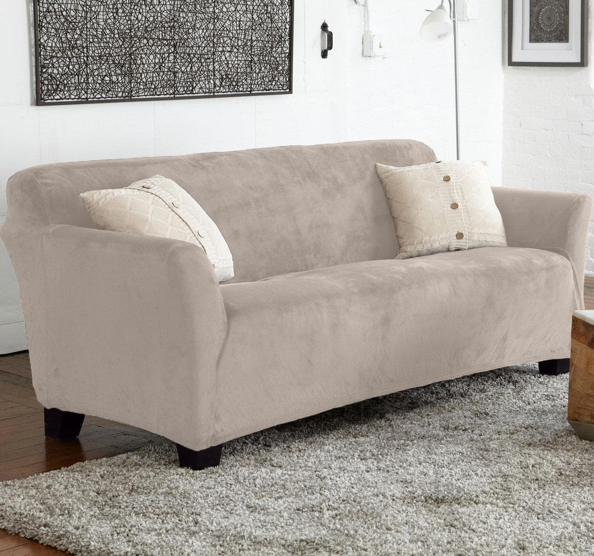 Velvet Stretch Slipcover Gale Collection on beige sofa with cream pillows Great Bay Home on Tampa Home & Garden Store