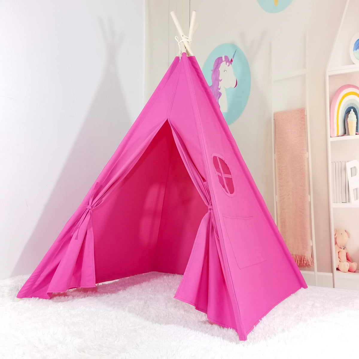 Pink cotton teepee play tent with white poles and fairy lights for indoor playroom nook on Tampa Home & Garden Store