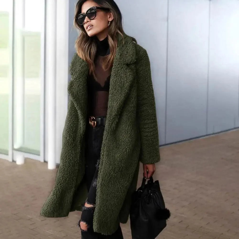 Stevvex olive green teddy coat, fleece jacket with oversized lapels on model, black bag on Tampa Home & Garden Store