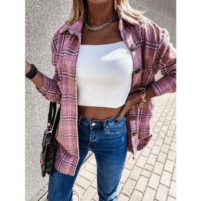 Stevvex pink plaid shirt jacket with lapel over white crop top and blue jeans, black handbag on Tampa Home & Garden Store