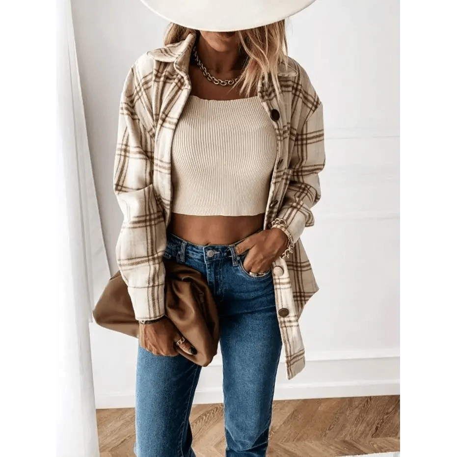 Stevvex plaid shirt jacket over beige ribbed crop top with blue jeans and tan clutch on Tampa Home & Garden Store