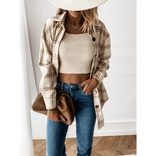 Stevvex plaid shirt jacket over beige ribbed crop top with blue jeans and tan clutch on Tampa Home & Garden Store
