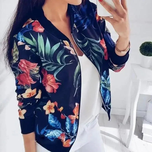 Women's floral bomber jacket navy with vivid red and orange blossoms, green leaves, zip front on Tampa Home & Garden Store