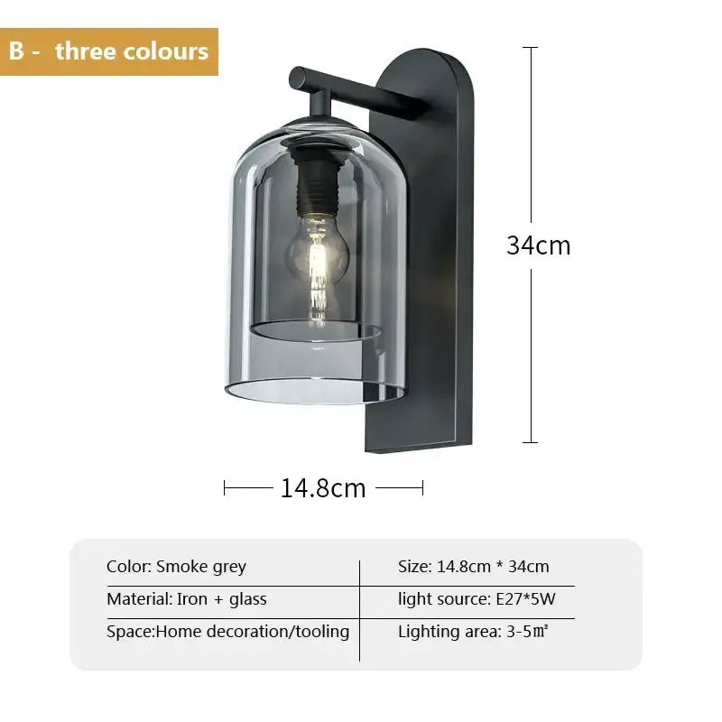 Luxury amber glass wall sconce with smoke grey iron backplate and glass shade on Tampa Home & Garden Store