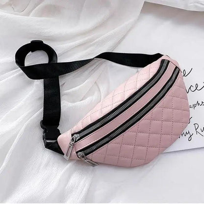 Pink quilted waist bag with dual zippers and a black adjustable strap on Tampa Home & Garden Store