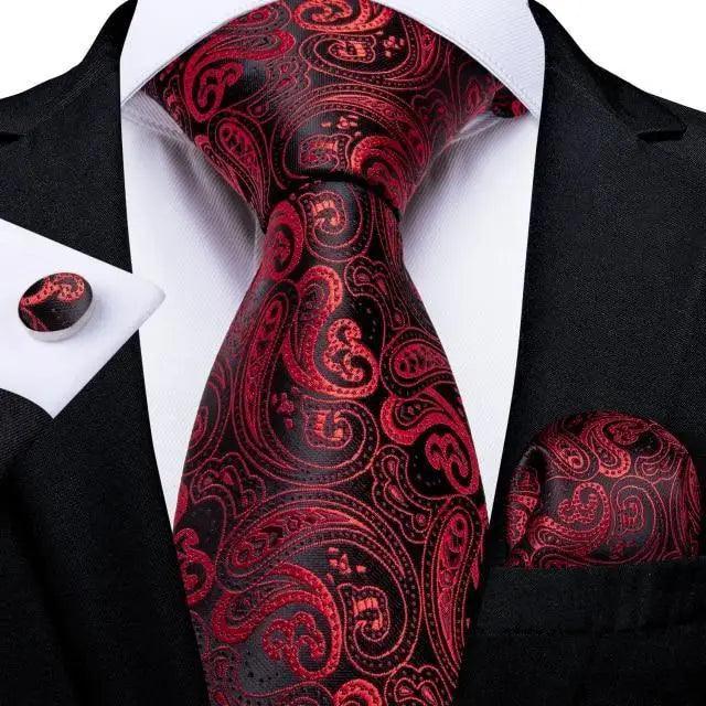 Stevvex red paisley silk necktie with matching pocket square on black suit on Tampa Home & Garden Store