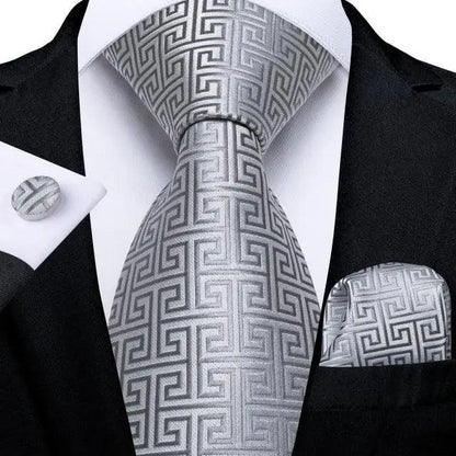 Stevvex men's silk tie with gray geometric pattern and coordinating pocket square cufflinks set on Tampa Home & Garden Store