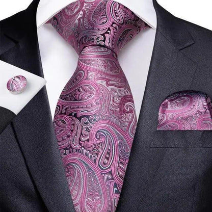Stevvex silk tie with pink-purple paisley design and matching pocket square on dark suit on Tampa Home & Garden Store