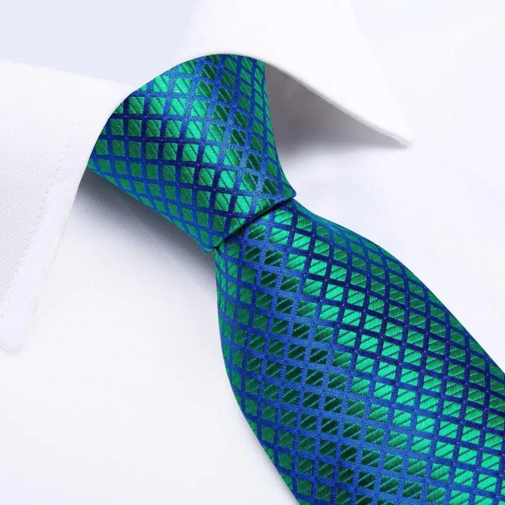 Blue silk necktie with green geometric grid pattern by Stevvex for men on Tampa Home & Garden Store