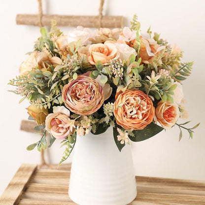 Stevvex luxury artificial silk rose bouquet in a white vase with peach ivory roses and greens on Tampa Home & Garden Store