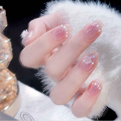 Luxury press-on nails 24-piece set by Shaketea in pink gradient glitter with rhinestones on Tampa Home & Garden Store