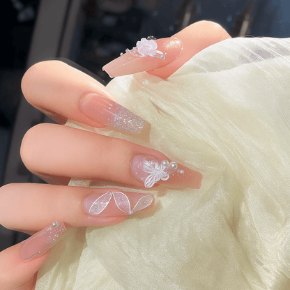 Shaketea luxury full-cover press-on nails with pink nude tips and white florals on Tampa Home & Garden Store