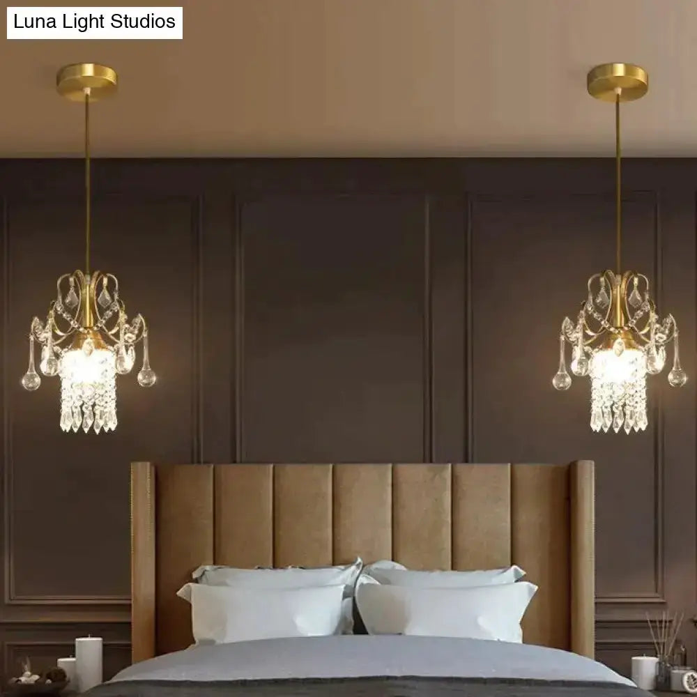 Luxury gold crystal pendant lights, dual chandeliers with dangling crystals above a bed on Tampa Home & Garden Store
