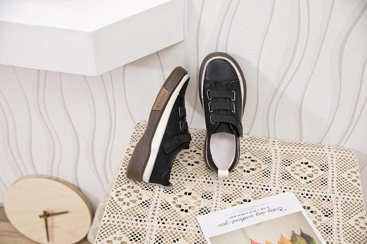 Stevvex genuine leather women's sneakers pair in black with white sole on Tampa Home & Garden Store