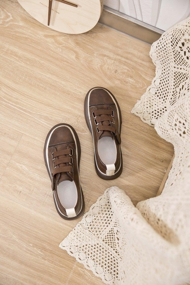 Stevvex brown luxury leather women's sneakers pair with white sole casual flats on wooden floor on Tampa Home & Garden Store