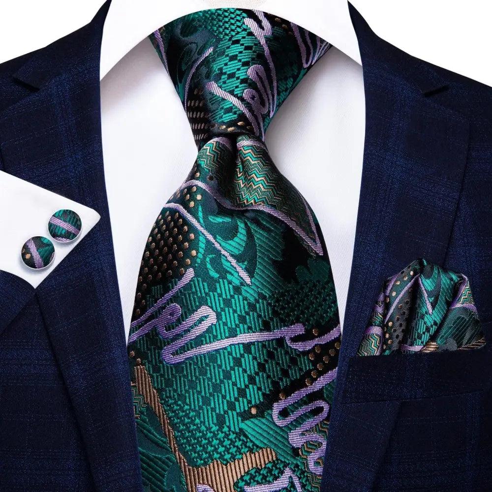 Stevvex silk necktie set with emerald green tie, pocket square and cufflinks on navy suit on Tampa Home & Garden Store