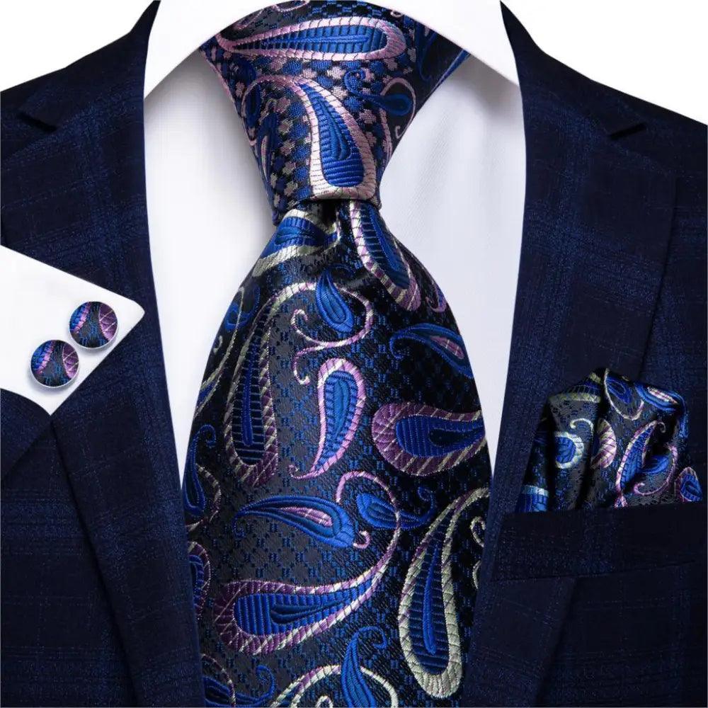Silk men's necktie with blue paisley pattern, matching pocket square and cufflinks set on Tampa Home & Garden Store