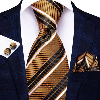 Stevvex silk necktie with gold brown diagonal stripes; pocket square and cufflinks on navy suit on Tampa Home & Garden Store