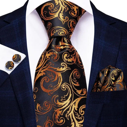 Silk necktie by Stevvex in black gold paisley print; matching pocket square and cufflinks on Tampa Home & Garden Store