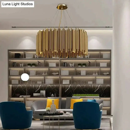 Luxury modern round gold chandelier with radial pendant light over living room seating on Tampa Home & Garden Store