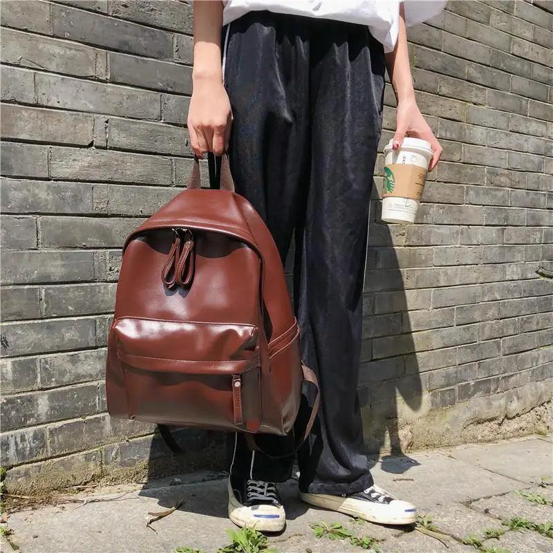 Brown PU leather backpack for women with front zip pocket and top handle, large capacity on Tampa Home & Garden Store