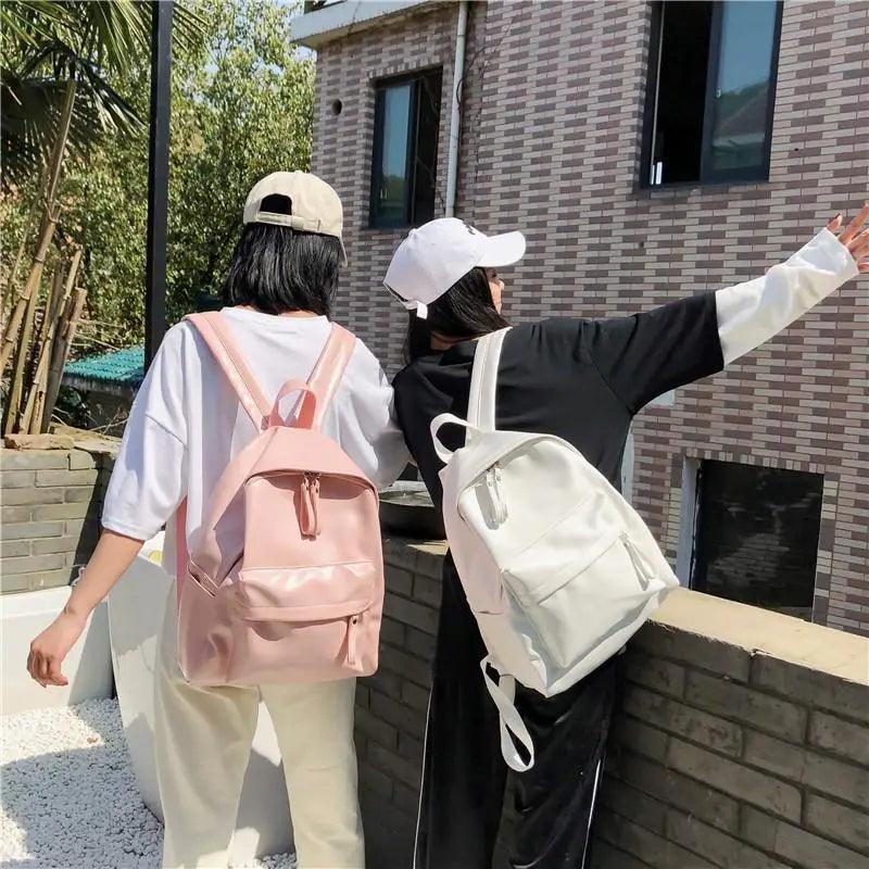 Stevvex PU leather backpack pink and white large-capacity student travel bag two backpacks shown on Tampa Home & Garden Store