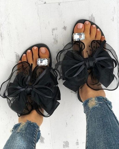 Bow sandals by Stevvex with rhinestone toe gem, large sheer bows, rubber flat sole on Tampa Home & Garden Store