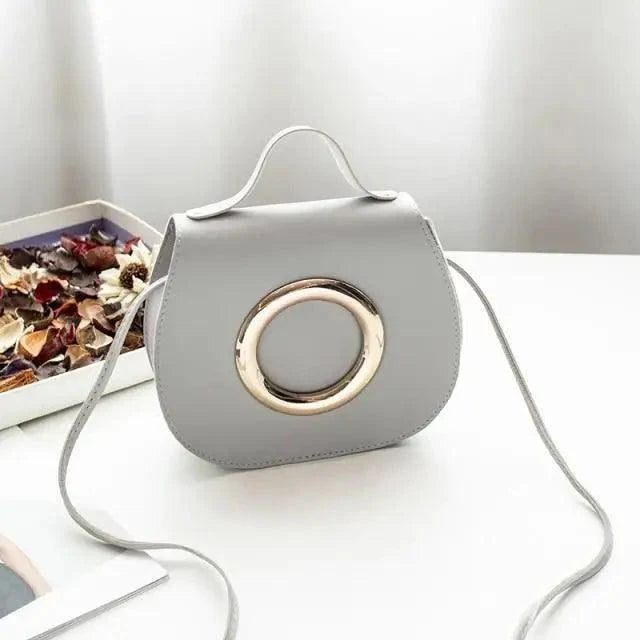 Crossbody bag in gray PU leather with gold ring by Stevvex on Tampa Home & Garden Store