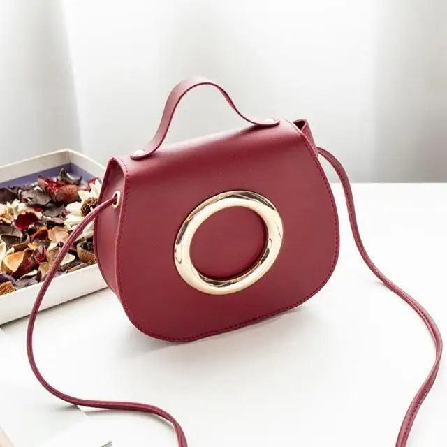 Stevvex PU leather crossbody bag, burgundy, gold ring accent, top handle and long strap on Tampa Home & Garden Store