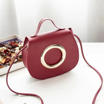Stevvex PU leather crossbody bag, burgundy, gold ring accent, top handle and long strap on Tampa Home & Garden Store
