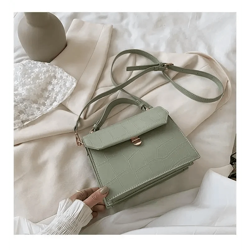 Stevvex crossbody bag in sage green crocodile-embossed PU leather with front flap, compact on Tampa Home & Garden Store