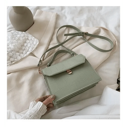 Stevvex crossbody bag in sage green crocodile-embossed PU leather with front flap, compact on Tampa Home & Garden Store