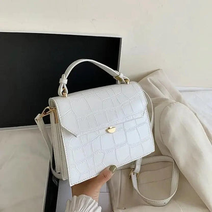 Stevvex white crocodile-embossed PU crossbody bag with top handle and gold hardware on Tampa Home & Garden Store