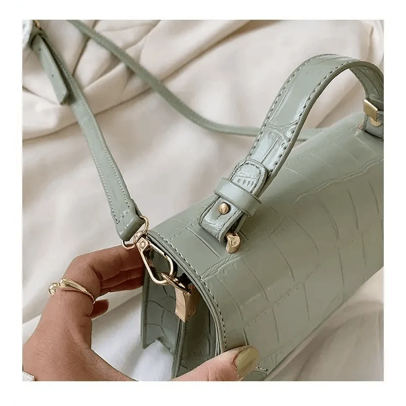 Stevvex crocodile-embossed crossbody bag in sage green with gold hardware on Tampa Home & Garden Store