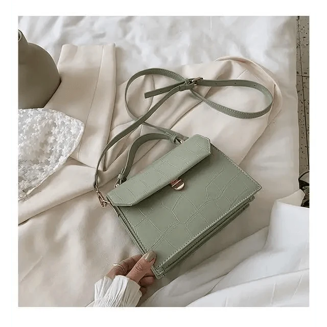 Crossbody bag Stevvex in sage green croc-embossed PU leather with flap and gold clasp on Tampa Home & Garden Store