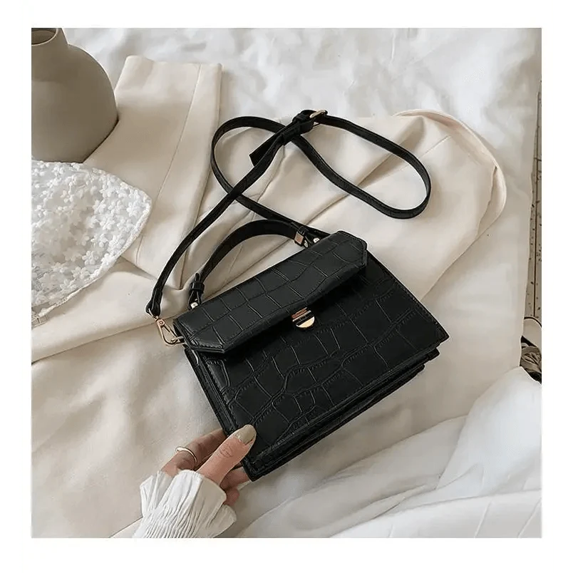Crossbody bag Stevvex black crocodile-textured PU leather with front flap and gold turn-lock on Tampa Home & Garden Store