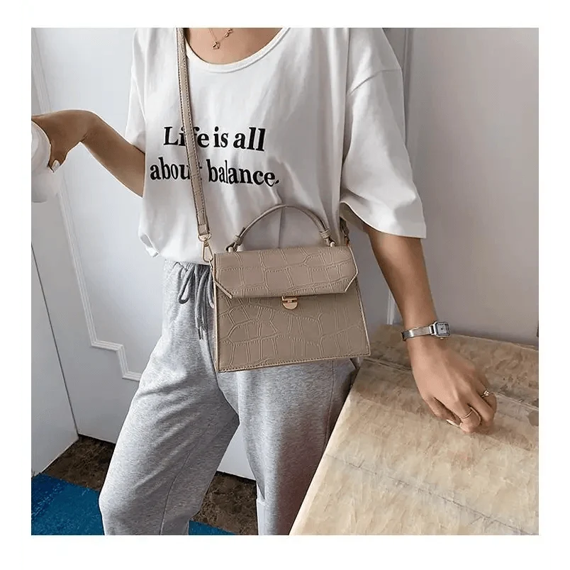 Stevvex crossbody bag in beige crocodile-embossed PU leather with top handle and adjustable crossbody strap on Tampa Home & Garden Store
