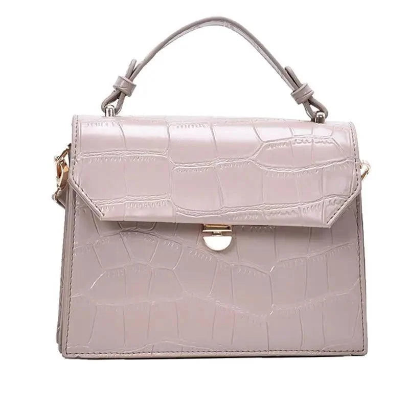 Stevvex pale pink crocodile-embossed PU leather crossbody bag with top handle on Tampa Home & Garden Store